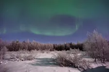 Noorderlicht boven Fins Lapland, in de buurt van Sodankylä. Het was er aan het begin van dit jaar langere tijd ijskoud - Vincent Guth