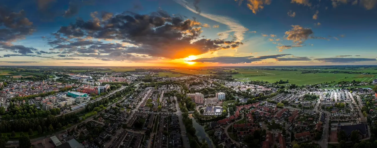 Zonsondergang boven Leerdam - John Oomen