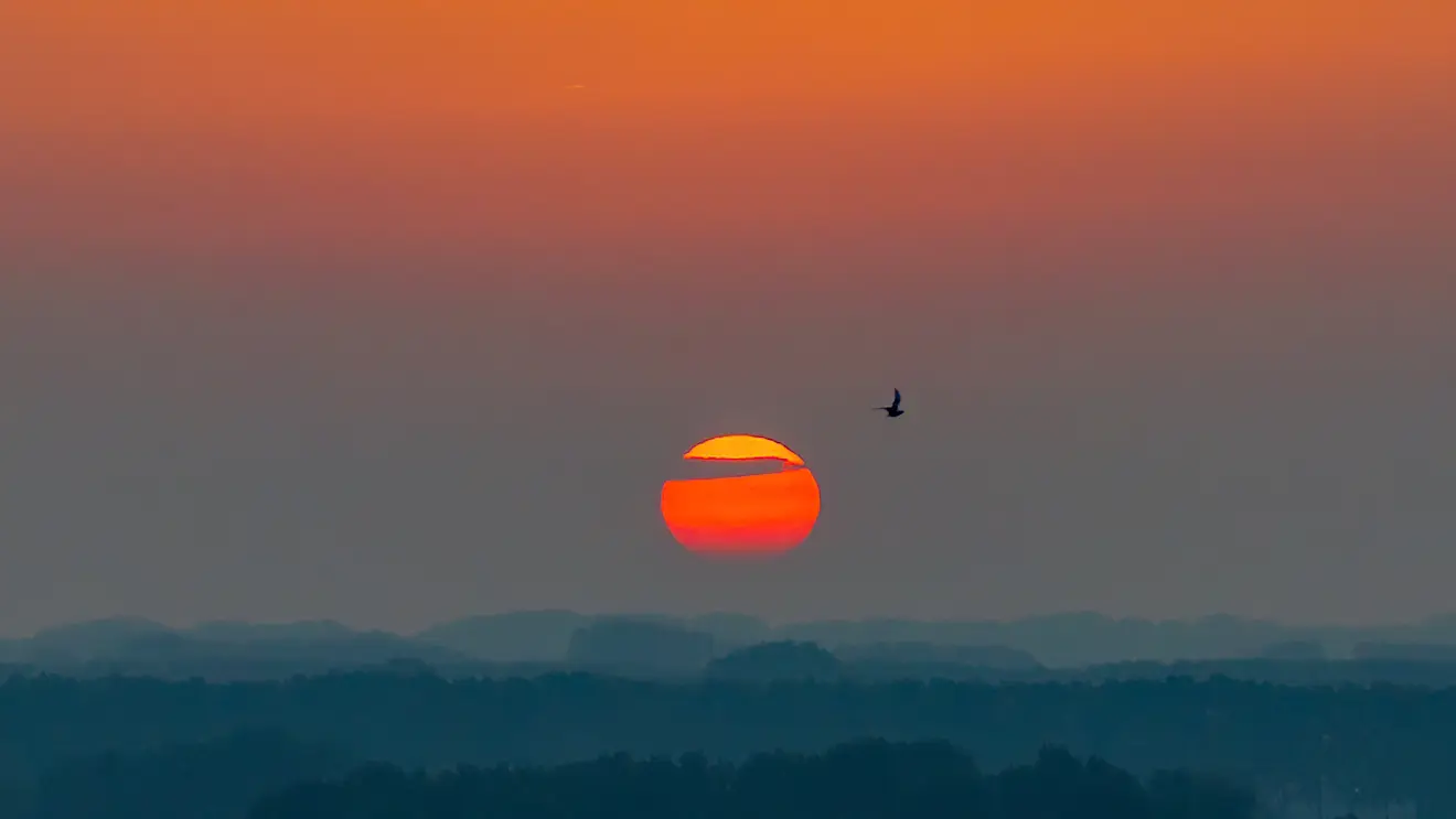 Zonsondergang boven Zuidwest-Nederland - Simone Wiersma