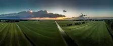 Een wolk schuift voor de zon, maar het is wel een mooi gezicht - John Oomen